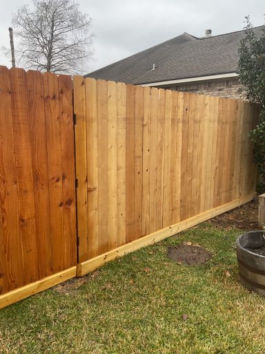Professional fence staining project in Montgomery, Tx by LRS Fencing & Gates